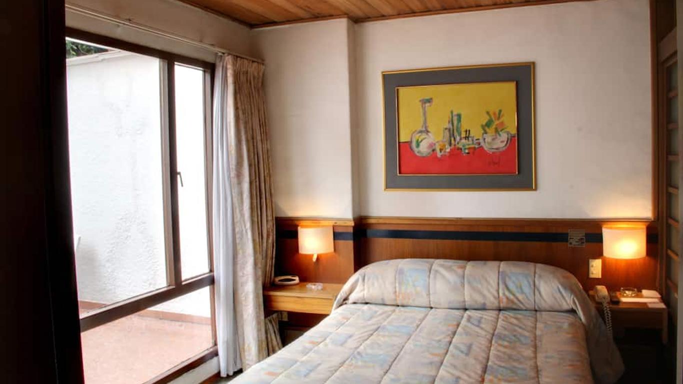 Suites Real 85