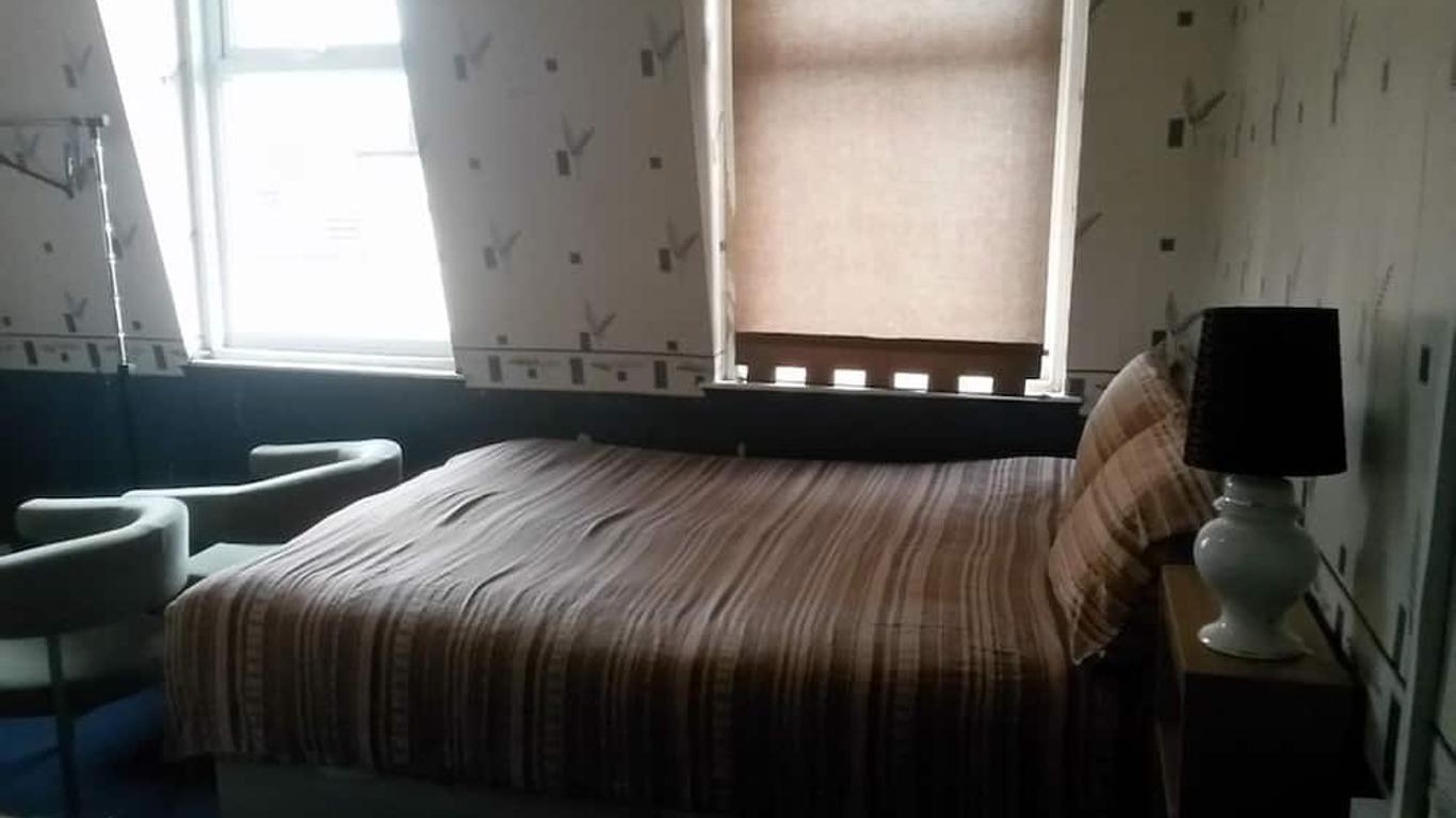Myroomz Orchid Hotel
