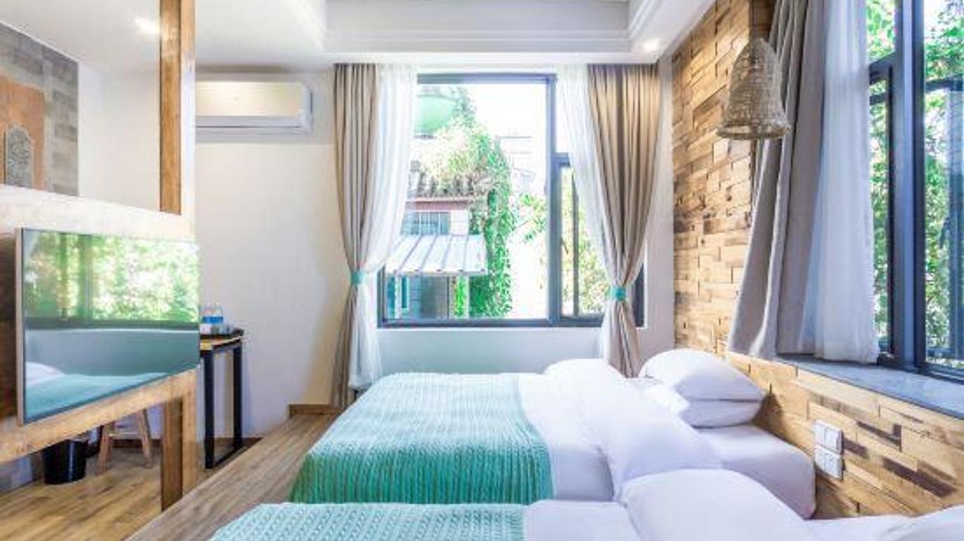 Dali Tomeinn Libai Holiday Hotel