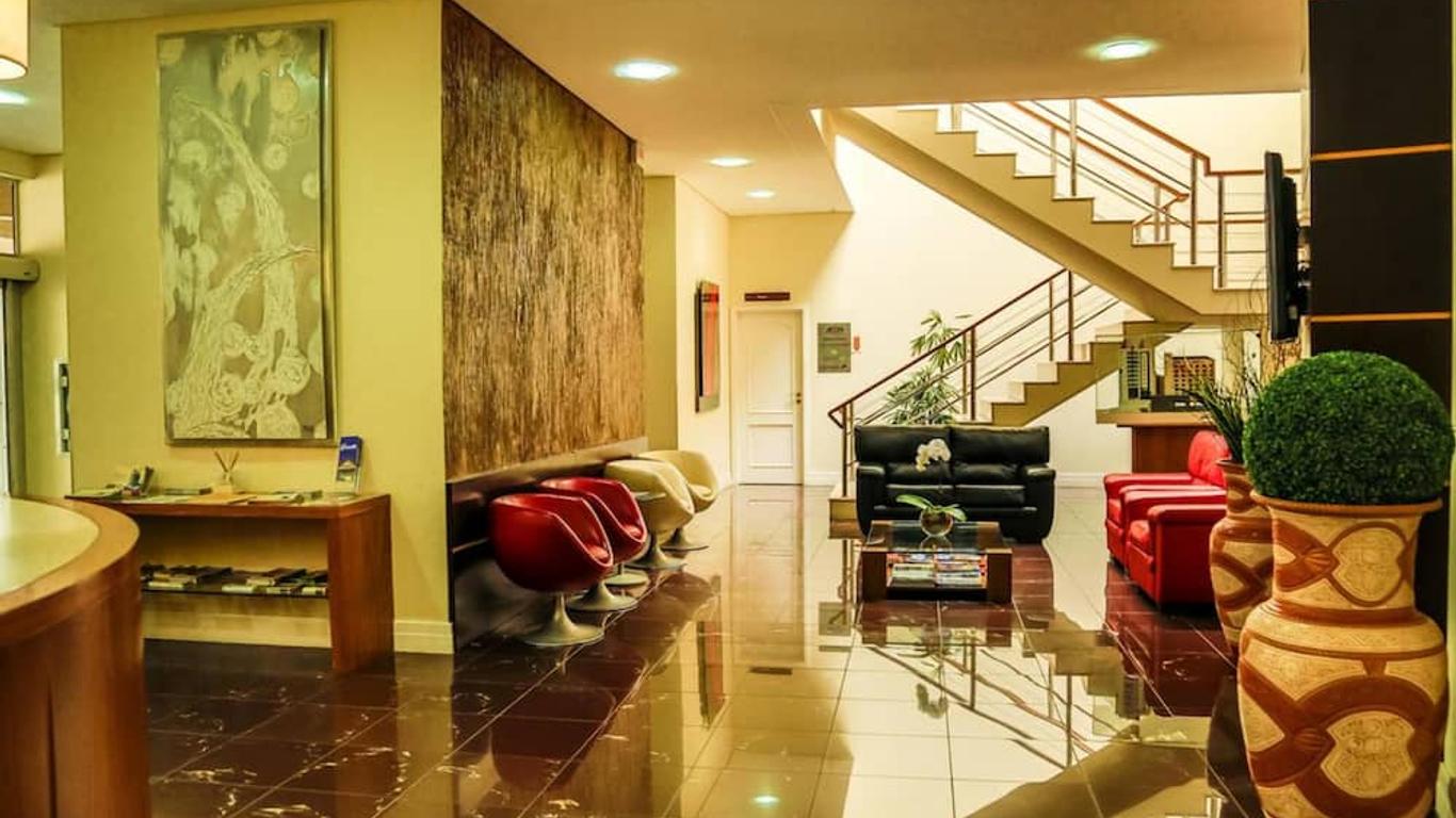 Le Village Flats e Hotel